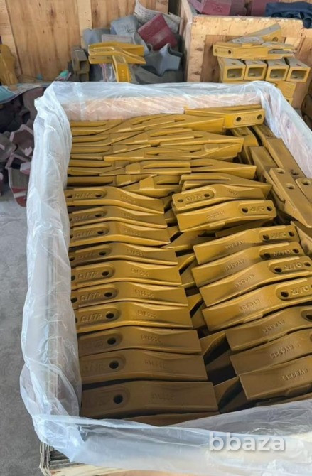 Зубья и бокорезы ковшей экскаваторов-погрузчиков Caterpillar Санкт-Петербург - изображение 1